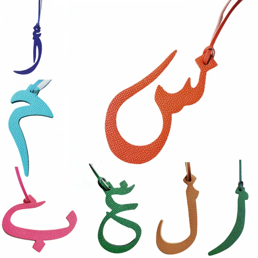 Wholesale Personalized Real Natural Leather Character Alphabet Arabic Letter Keychain Backpack Pendant Ladies Women Bag Charm