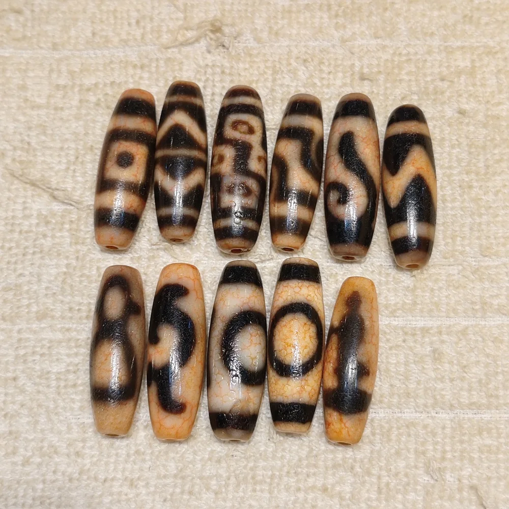 

1pcs Tibetan Natural Agate Dzi Taiwan Permeable Horseshoe Weathered Soil Qin Blood Silk Tianzhu Necklace Pendant DIY Accessories