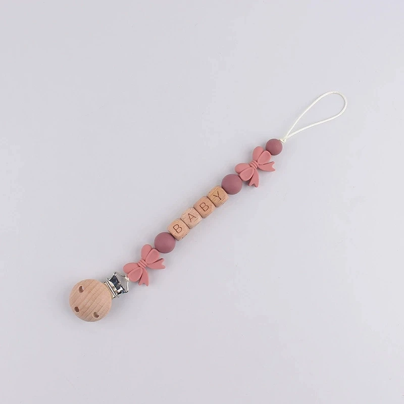 Anpassbare Namens-Baby-Schnullerkette aus lebensmittelechtem Silikon mit Schleife, Anti-Verlust-Clip und Beißspielzeug-Lanyard für Neugeborene