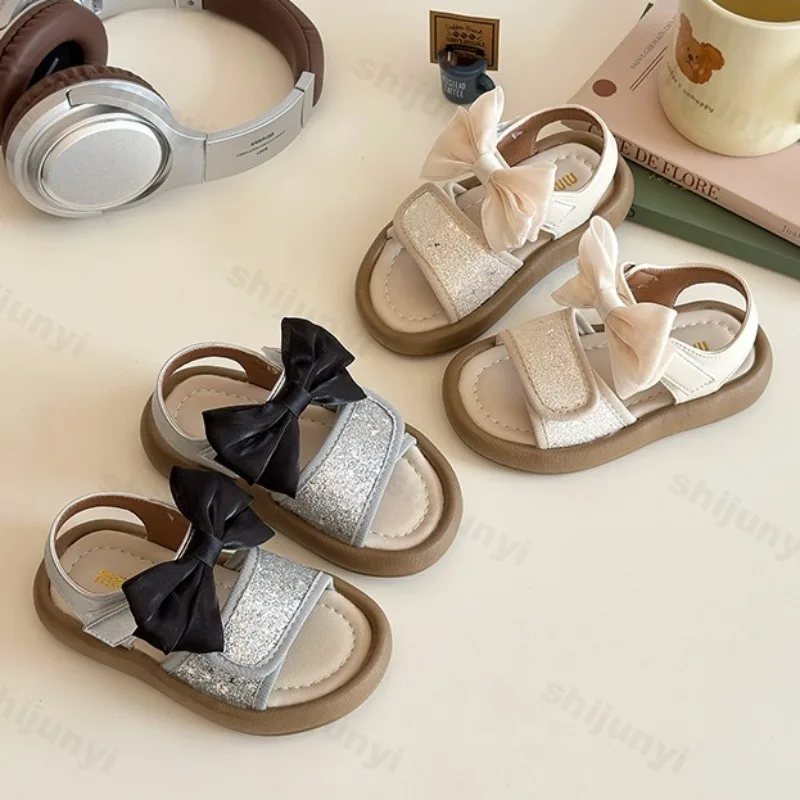 

Children's Bow Designed Fashion Casual Sandals 2025 New Girls' Open Toes Comfortable Shiny Princess Shoes Soft soled Beach Flats