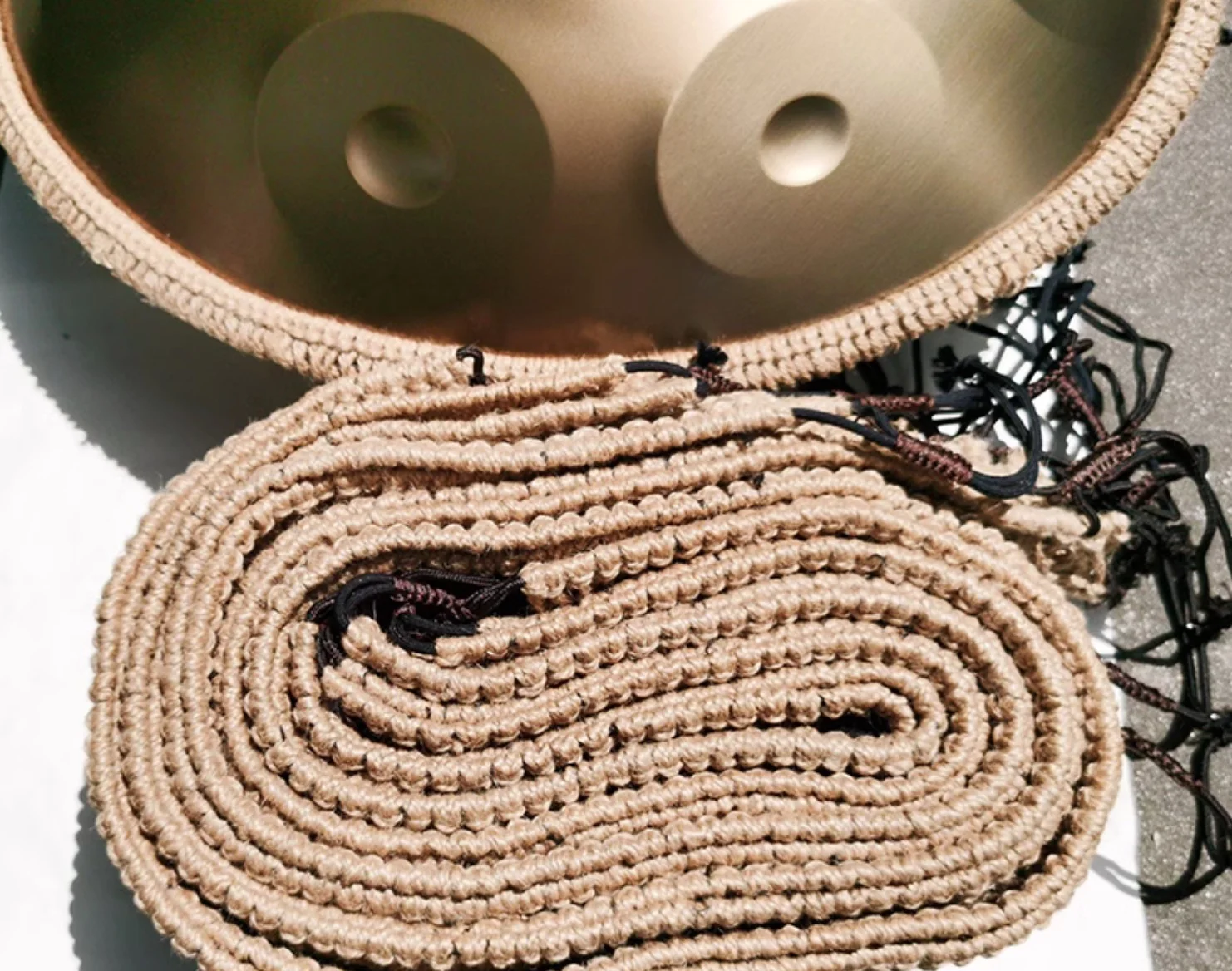 

Braided rope for hanpanMusical instrument attachment
