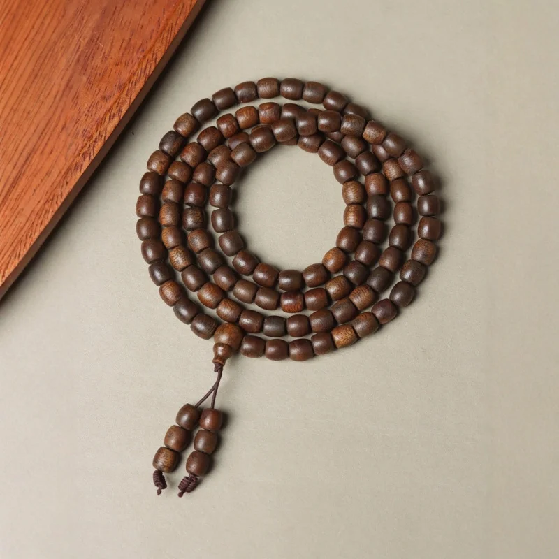 

Authentic 06x108 of old Nha Trang golden silk agarwood drum beads, sweet fragrant, multi-loop bracelet for men and wom