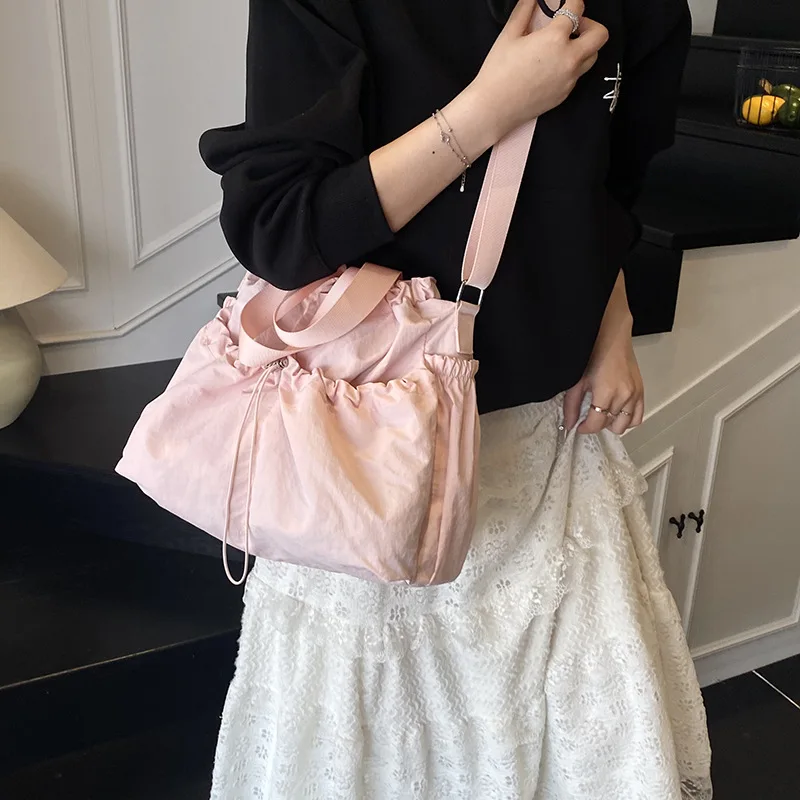 2025 New Nylon Drawstring Backpack for Women, Spacious Travel Rucksack, Water-Resistant Gym Bag, Versatile & Lightweight​