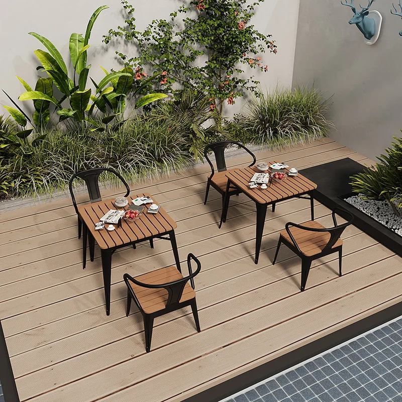 

Outdoor tables and chairs Outdoor courtyard Balcony Waterproof and sunscreen Plastic wood table and chair combination