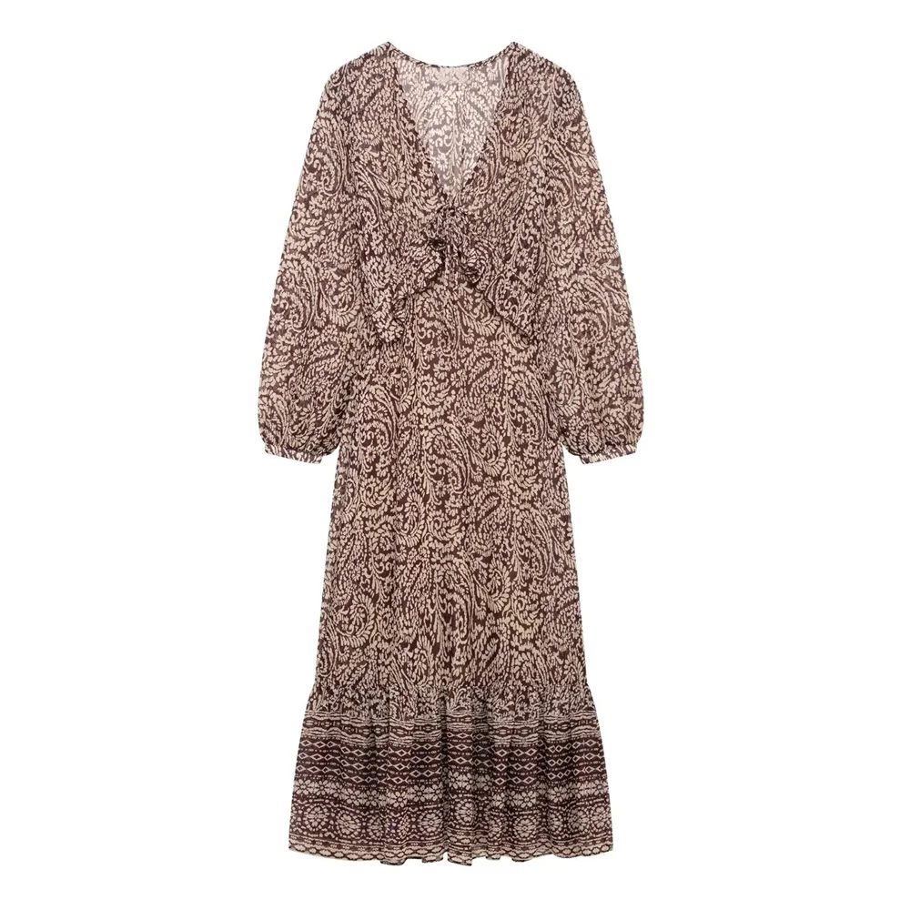 PB&ZA's new women's dress features a V-neck, long puff sleeves, knot details and paisley pattern for a vintage look