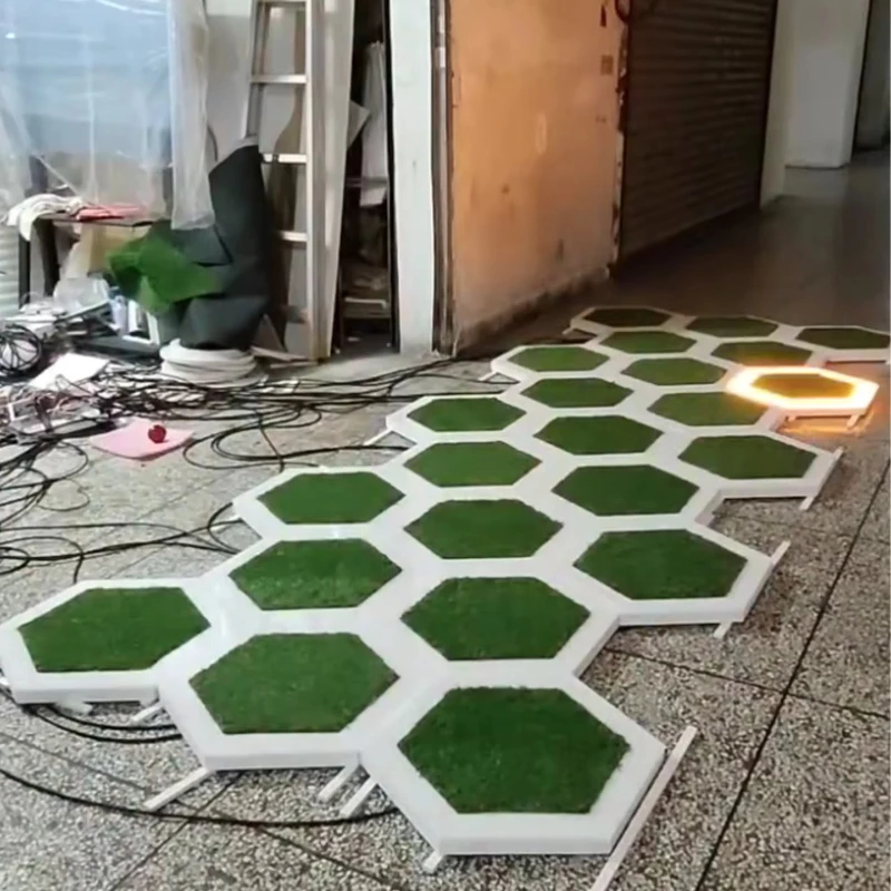 Playing football with luminous tiles, interactive football, stepping on lights to play football,