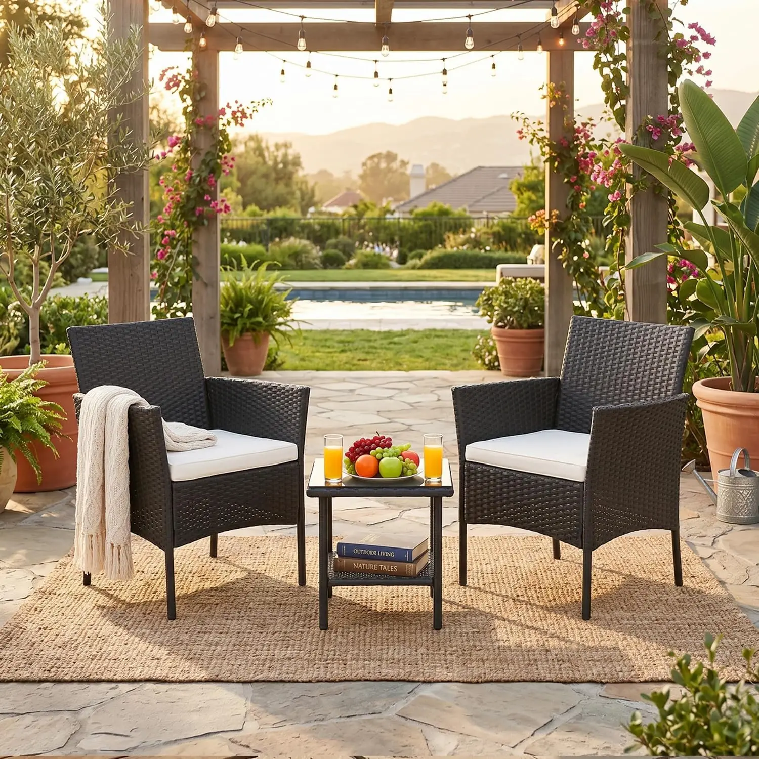 All-black 3-piece rattan wicker outdoor conversation set including two single chairs and a glass coffee table, versatile seating for yard, lawn, porch, poolside and narrow balcony