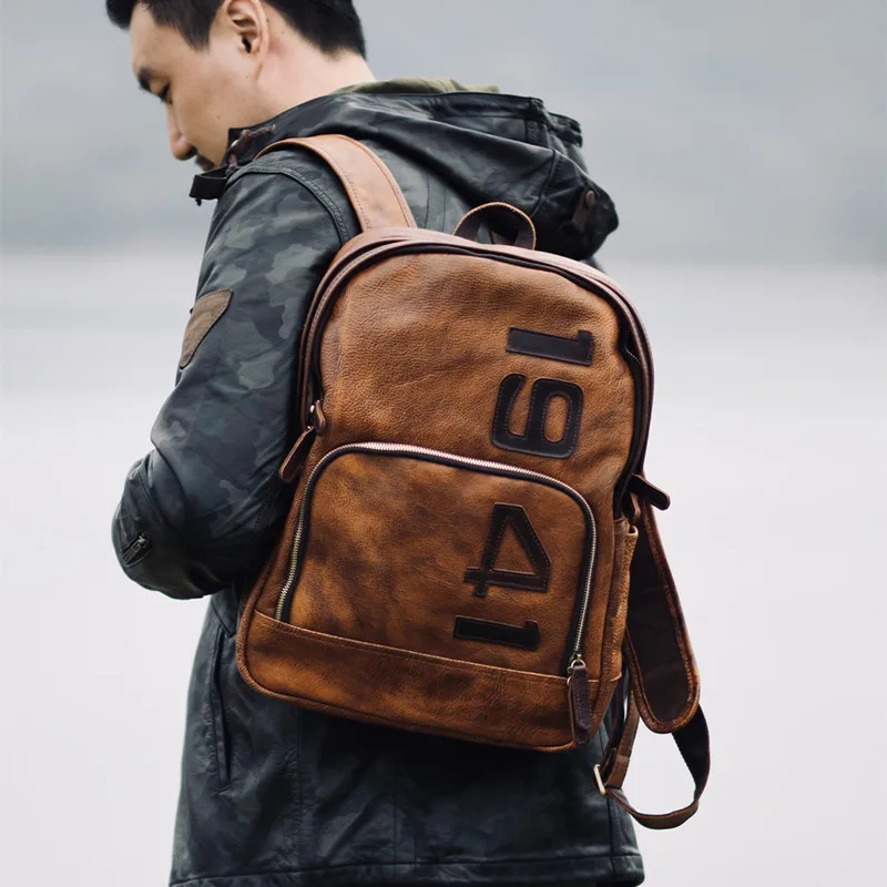 

PNDME vintage designer handmade genuine leather men's backpacks casual outdoor daily natural cow leather women's schoolbags