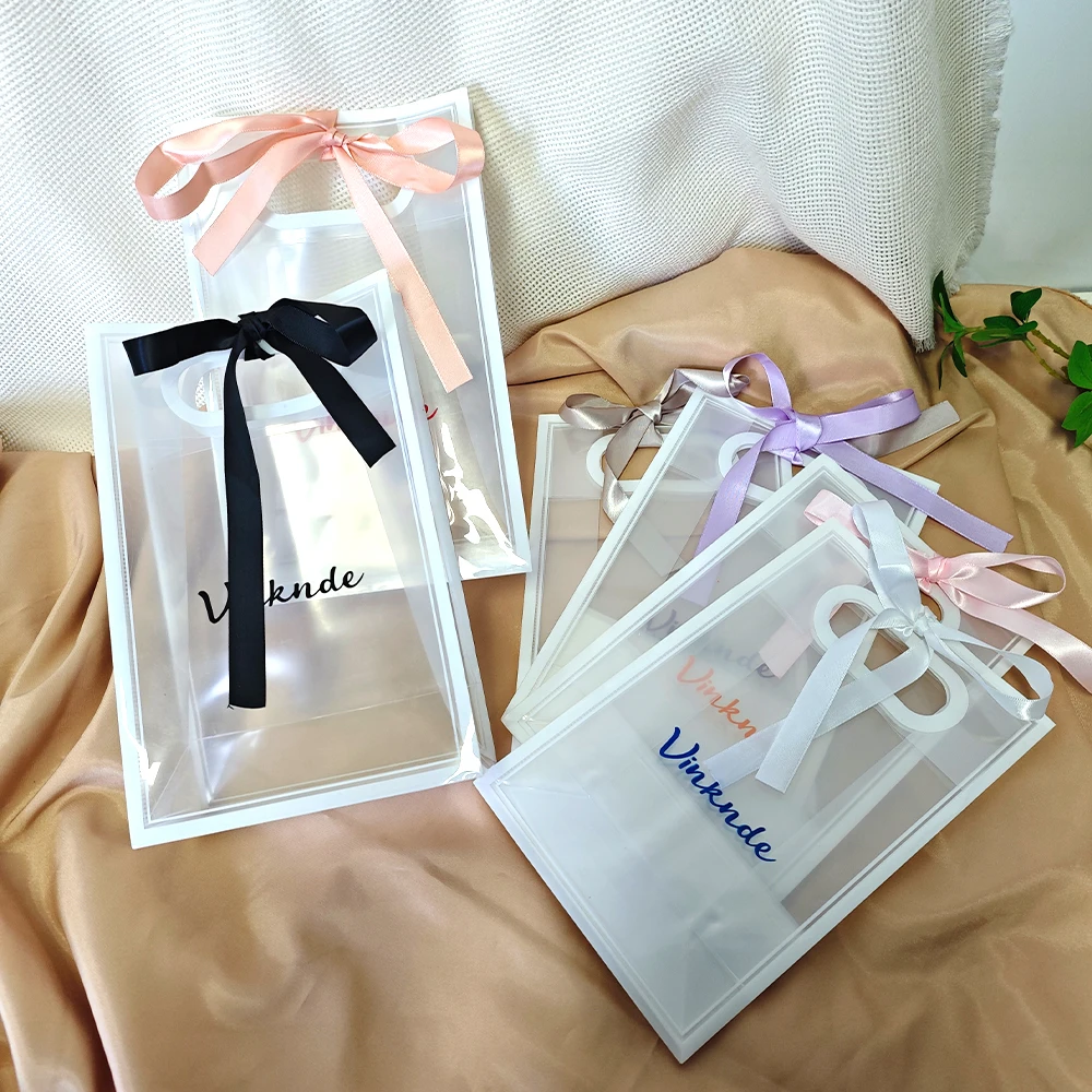 

Custom Logo Reusable White Clear Plastic Gift Bags with Bow Ribbon Handles PP Party Favors for Birthdays Weddings Christmas Bulk