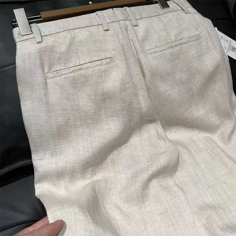 Pantaloni di lino tinta unita da uomo alla moda Pantaloni di lino dritti larghi drappeggiati casual autunnali Pantaloni di lino vintage da uomo streetwear