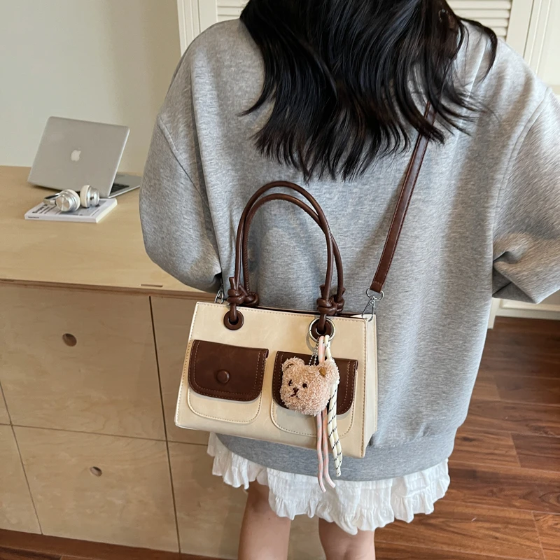 

Unique Minimalist Elegant Tote Bag For Women Casual Leisure Fashionable Letter Logo Solid Color