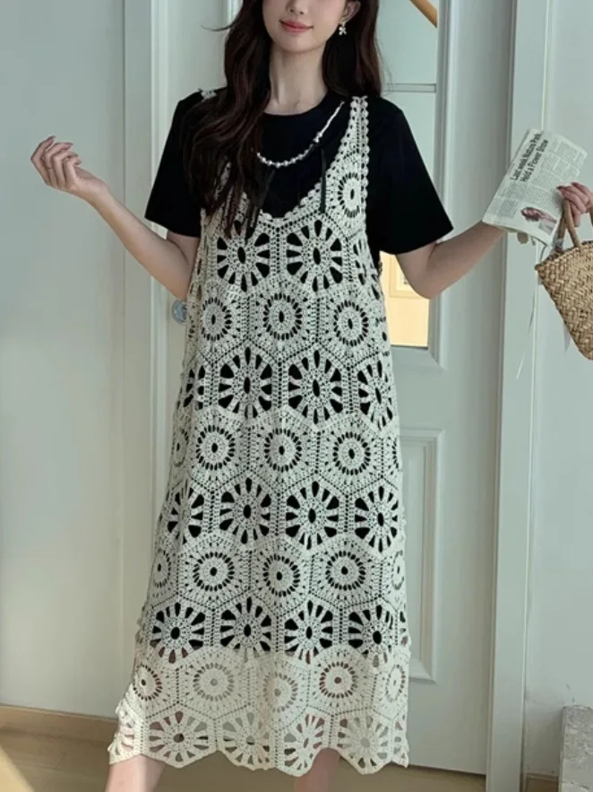 2025 Vestido de tirantes huecos de encaje de ganchillo estilo festivo sin mangas en capas vestido bohemio de playa de longitud media