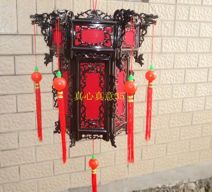 Plug in wooden colored red lantern eaves corridor