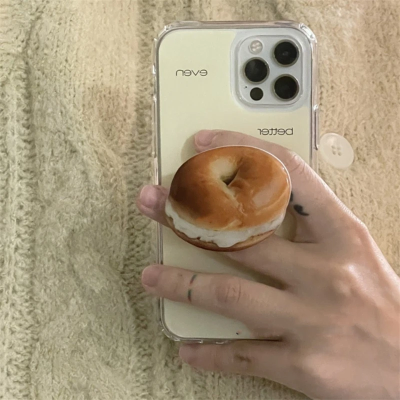 Simpatico supporto per telefono Bagel Griptok di simulazione, anello universale per telefono, impugnatura per alimenti Tok per iPhone, staffa pieghevole Samsung