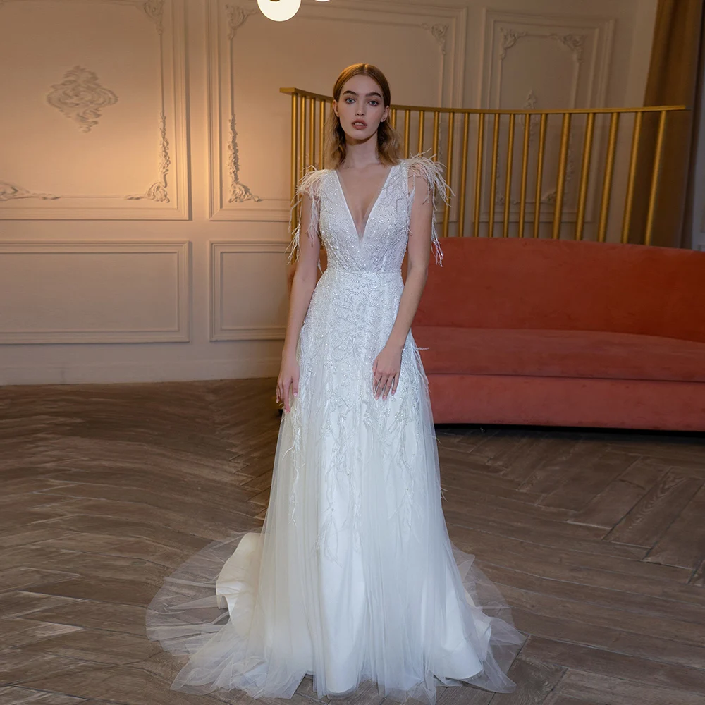 Customized Exquisite Wedding Dresses V Neck Glitter Bridal Gowns Sequined Beads Feather Backless A-Line Tulle Vestidos De Novia