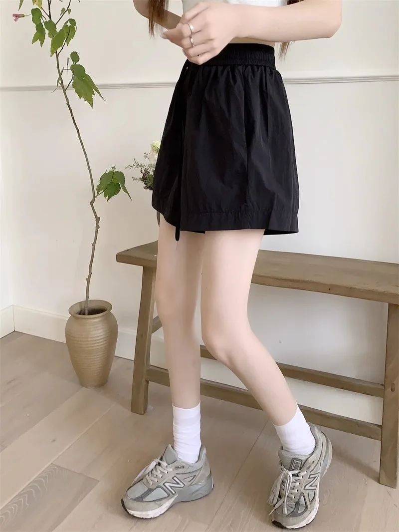 Pantalones cortos para mujer Y2K Denim Harajuku Vintage tiro bajo caliente Mini cadera envuelto ropa de calle azul moda botín pantalones de verano europeos