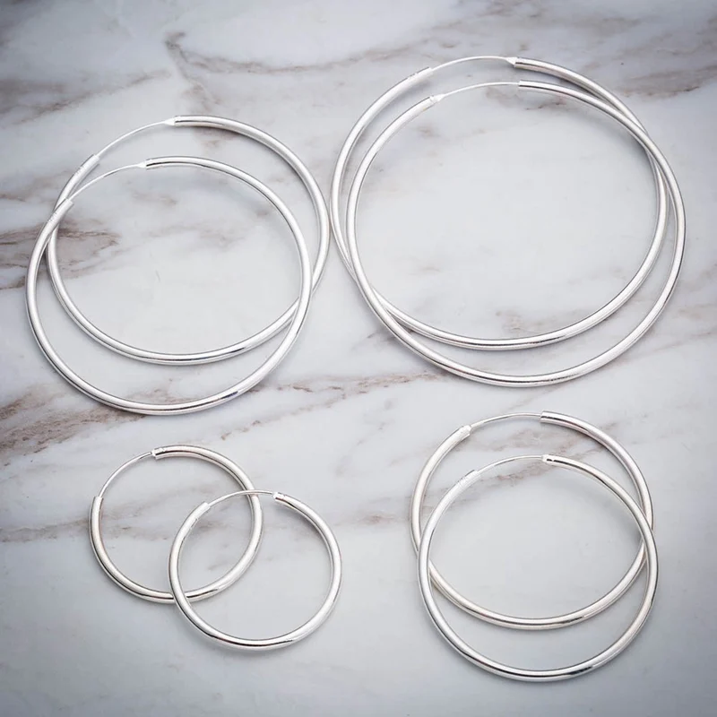 Женские серьги-кольца 3-7 см Женские серьги-кольца 3-7 см