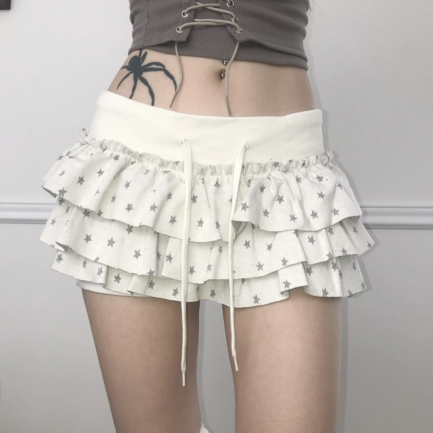Moda coreana che dimagrisce con coulisse stella stampa dolce moda torta gonna da donna