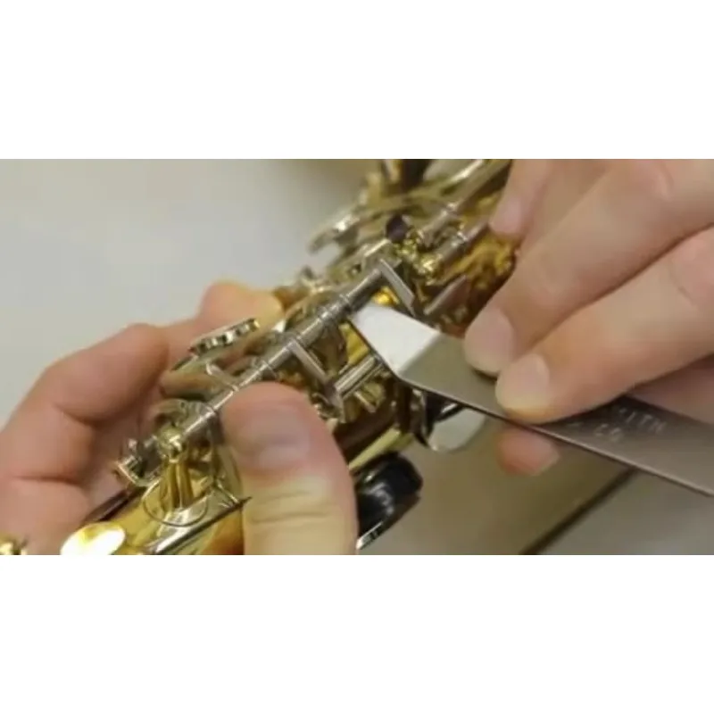 Saxophone instrument repair tool multi-purpose adjustment piece pry bar