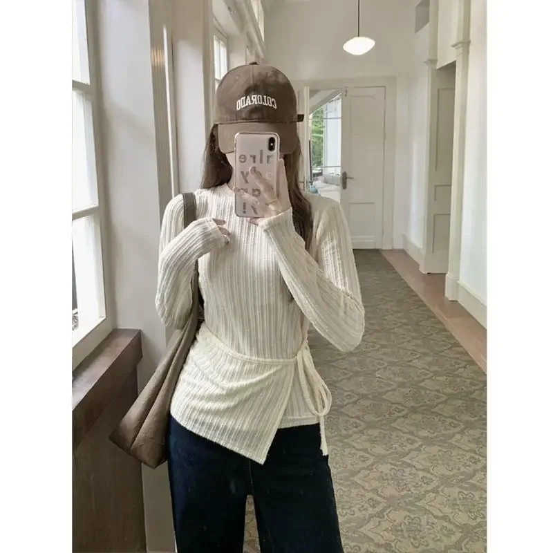 

Design Sense Vertical Stripe Texture Knitted Women's Irregular Splicing Lace Up Slim Fit Unique Round Neck Long Sleeved Top