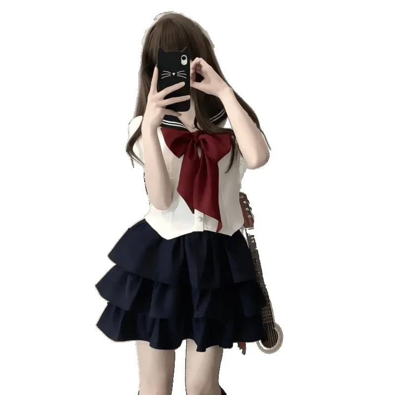 Japoński mundurek szkolny JK, dziewczęca koszula z granatowym kołnierzykiem i dużą kokardą, letnia czarna spódnica typu cake z wysokim stanem, spódnice z efektem bufki.