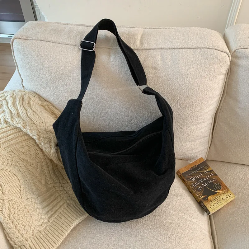 

Women's casual sports fitness large capacity bag2025New Simple Black Crossbody Canvas Bag Single Shoulder Dumpling Bag