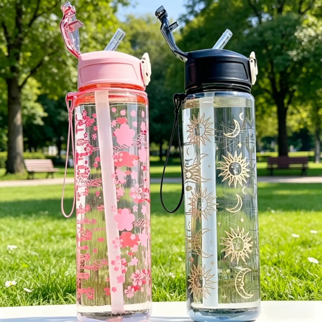750ML New Creative Trendy Printed Space Cup with a Portable Strap, Pop-Up Lid, Plastic Design