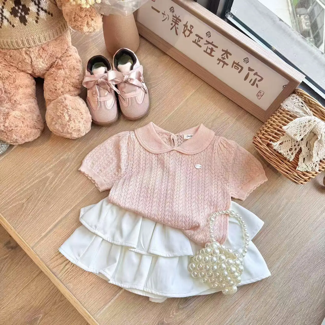 

Korean 2026 Summer New Girls Pink Hollow Out Sweet Turn-down Collar Knitted Short Sleeved Top Cake Skirt Two Piece Set
