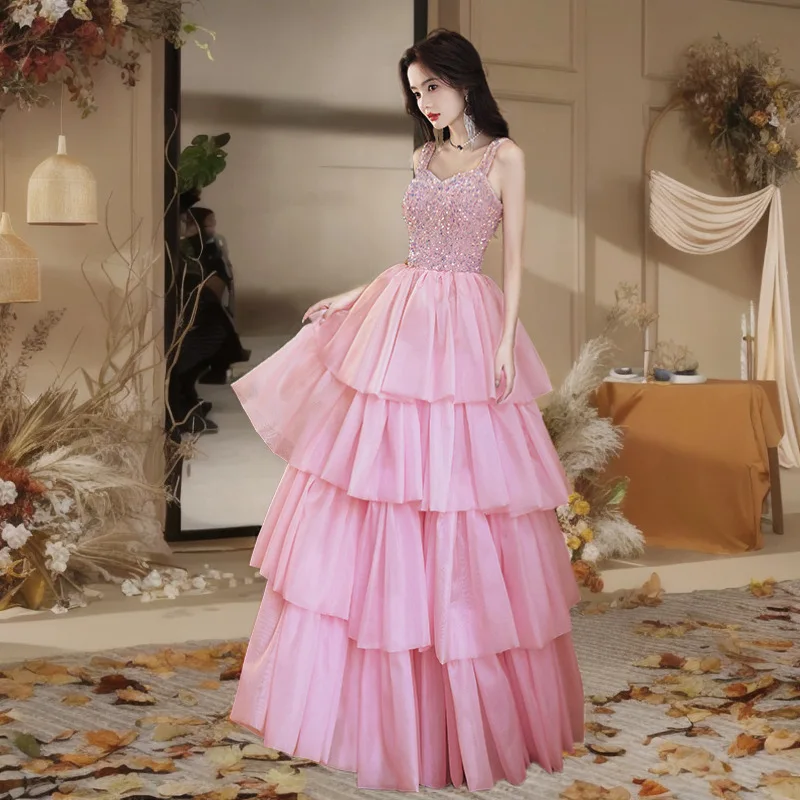 

Летнее женское розовое сексуальное вечернее платье 2026 года с блестками и бретельками, модное, стройнящее, для банкетов, с открытой спиной, с юбкой-тортом