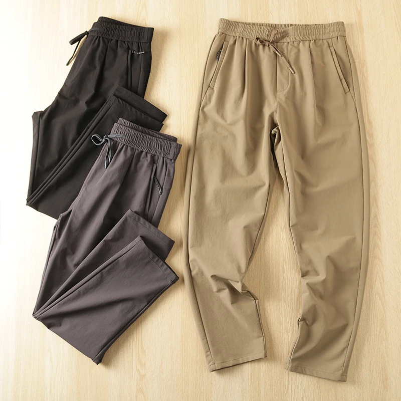 

Мужские однотонные повседневные брюки с эластичной резинкой на талии и прямыми штанинами, эластичная четырехсторонняя техническая ткань, универсальные осенние удобные брюки...