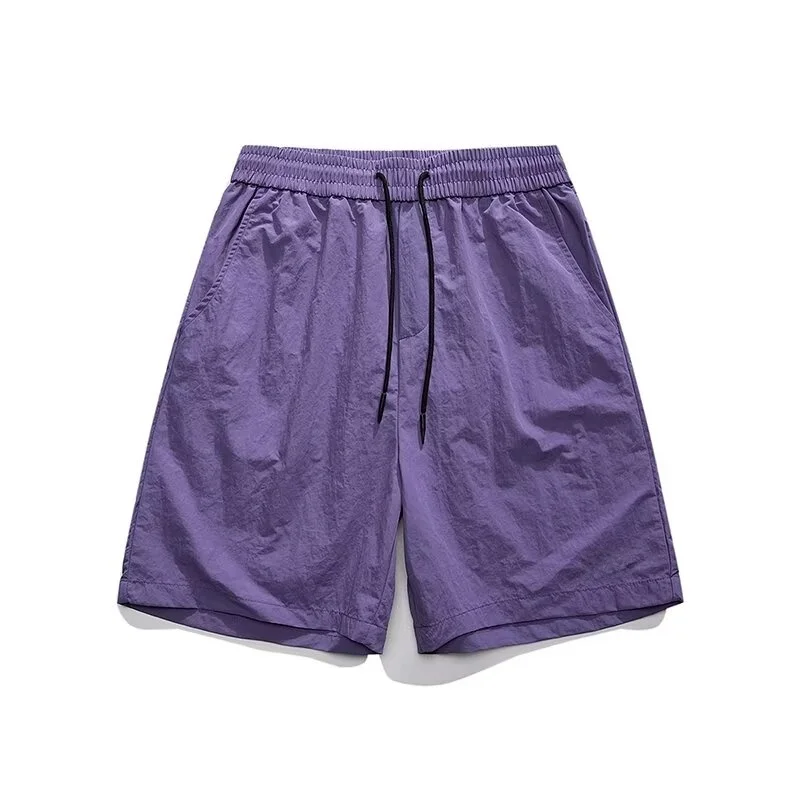 شورت رجالي صيفي كاجوال للشاطئ من الحرير الجليدي سريع الجفاف رقيق رياضي فضفاض بطول خمسة أرباع للشباب بأسلوب نشط بلون الكاكي