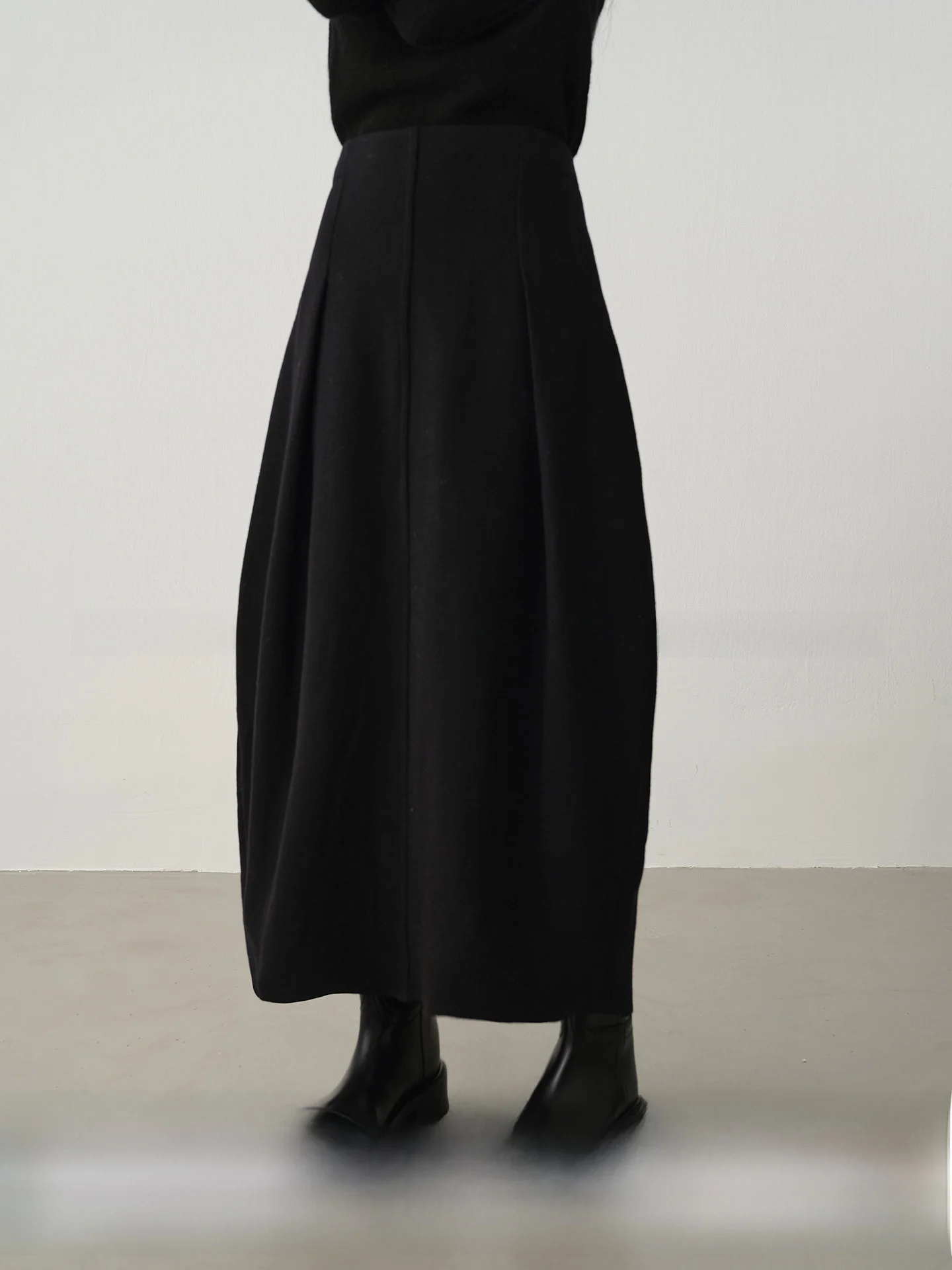 

Elegant Double Layered Woolen Shaped Half Skirt by CHICJANE Stylish Black Swan 3D Slimming Design for Women