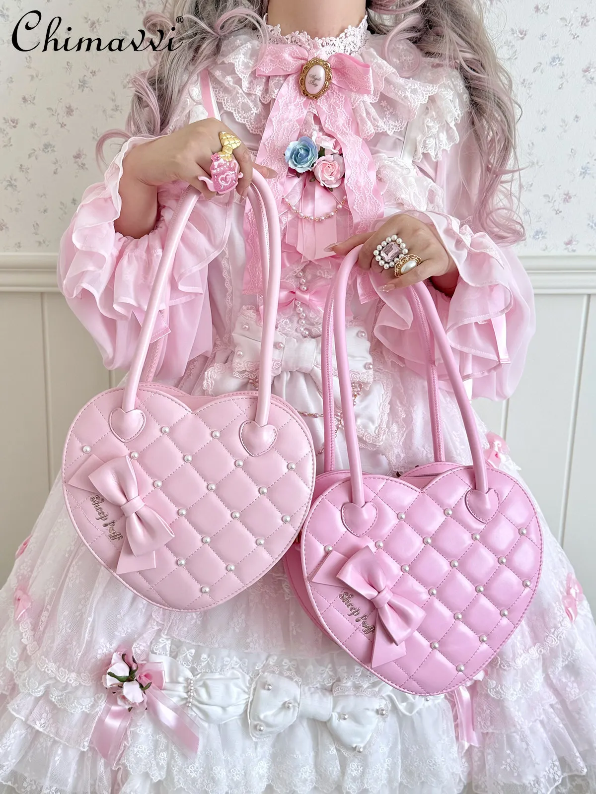 

Japanese Sweet Pearl Heart Bag 2026 New Fashion Cute Bowknot Handbag Elegant Versatile Women's Princess Crossbody Bag