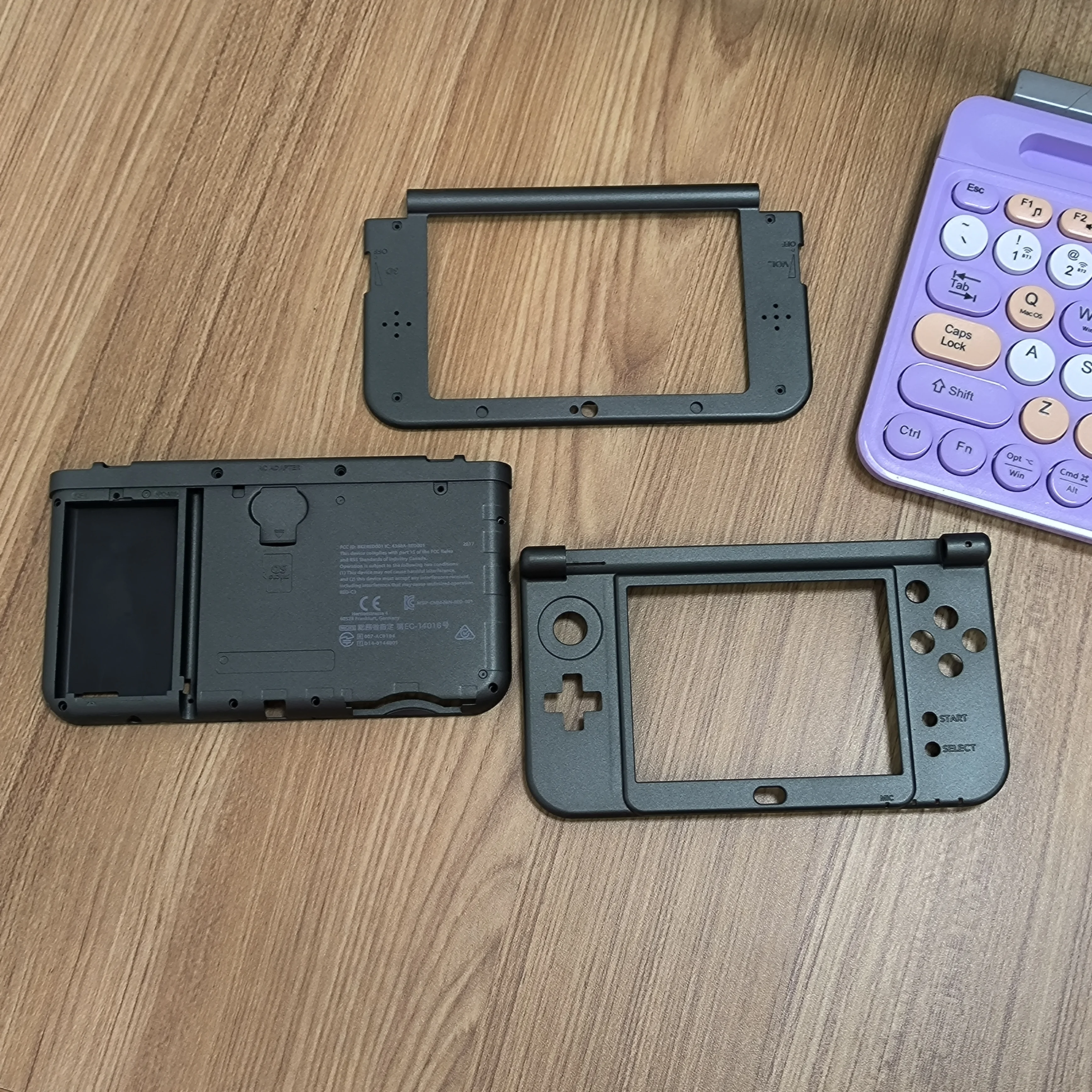 Custodie per batterie e telaio centrale superiore e inferiore originali per la NUOVA console 3DS XL/LL