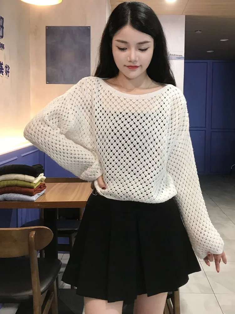 เสื้อสเวตเตอร์ถักไหมพรมผู้หญิงระดับไฮเอนด์ ดีไซน์หลวมสบาย ทรงหลวม ดีไซน์โปร่ง แขนยาว คอกลม เหมาะสำหรับฤดูใบไม้ร่วง แฟชั่นสตรีทแวร์