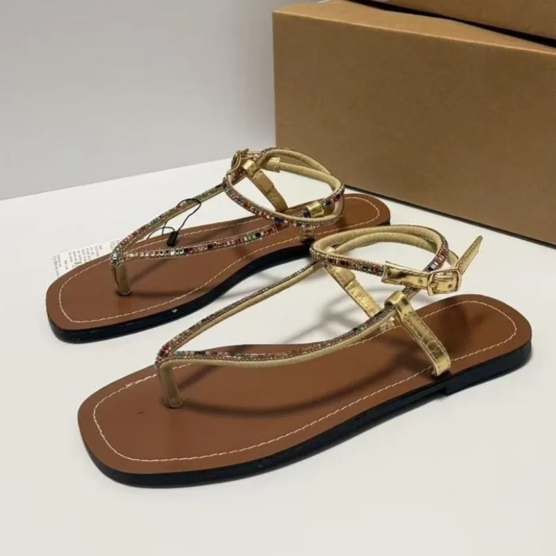 

Летние женские римские сандалии 2026 года с застежкой на пальцах, блестящими стразами, нескользящей подошвой, для повседневной носки, комфортные, для пляжного отдыха