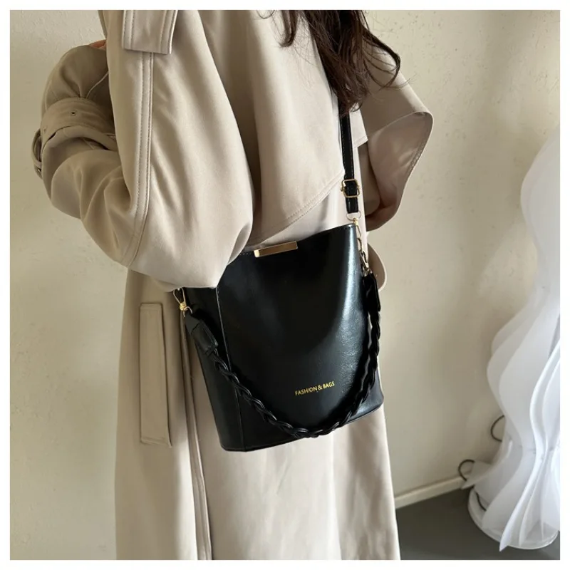 

Soft Leather Large Capacity Crossbody Bag Simple Woven Strap Shoulder Bag Women's Winter Versatile Bucket Female Shoulder Bag