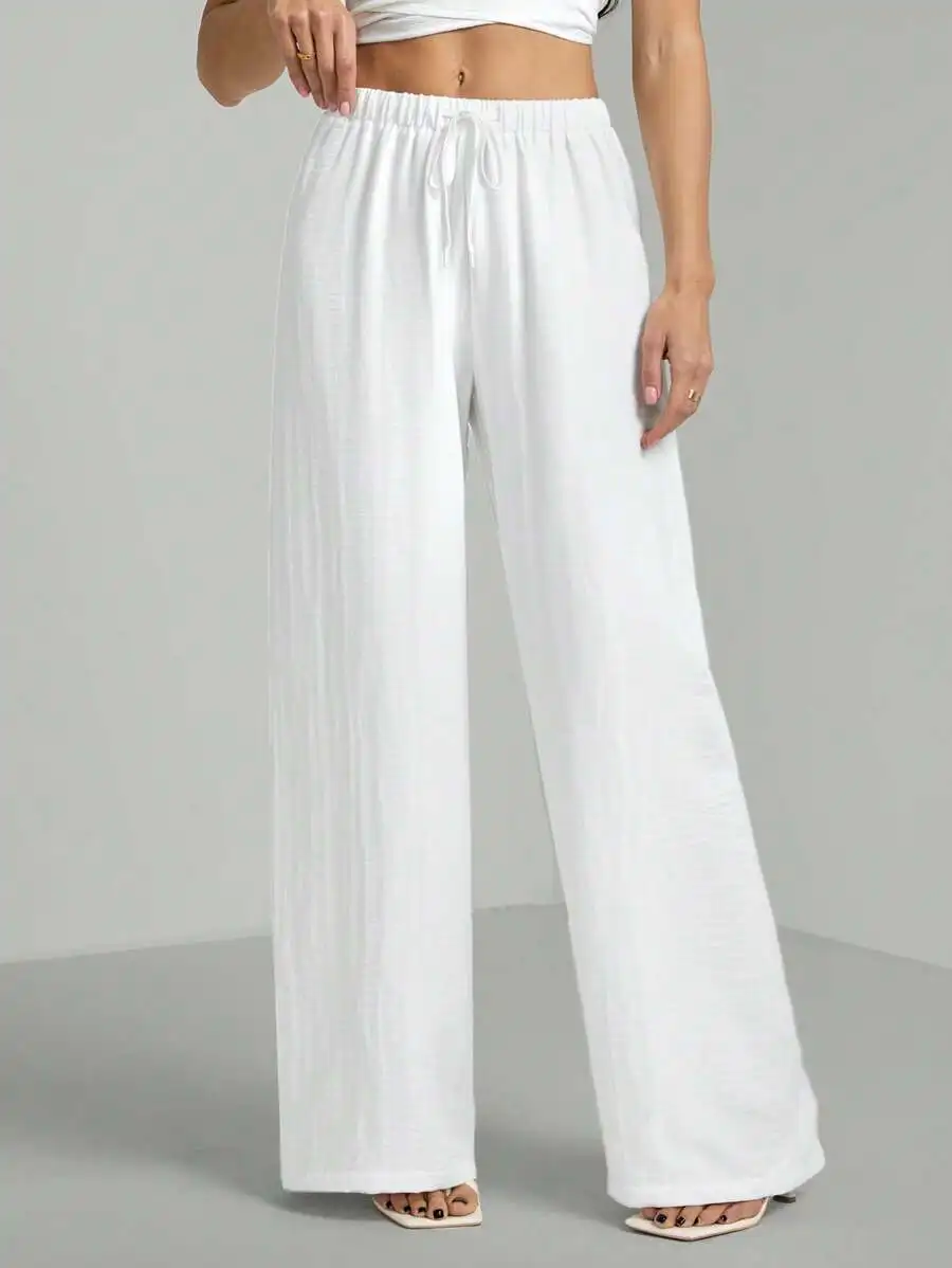 

Белые широкие брюки с завязками на талии из жатой ткани