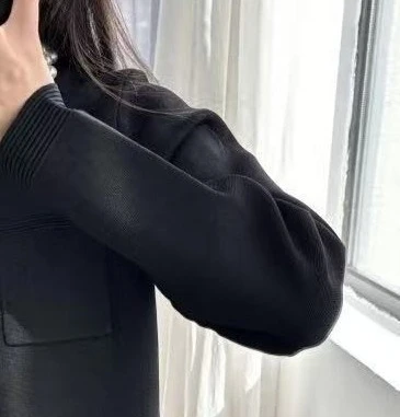 

Women's black round neck two piece suit with pearl embellished long sleeve cardigan or slim fit skirt