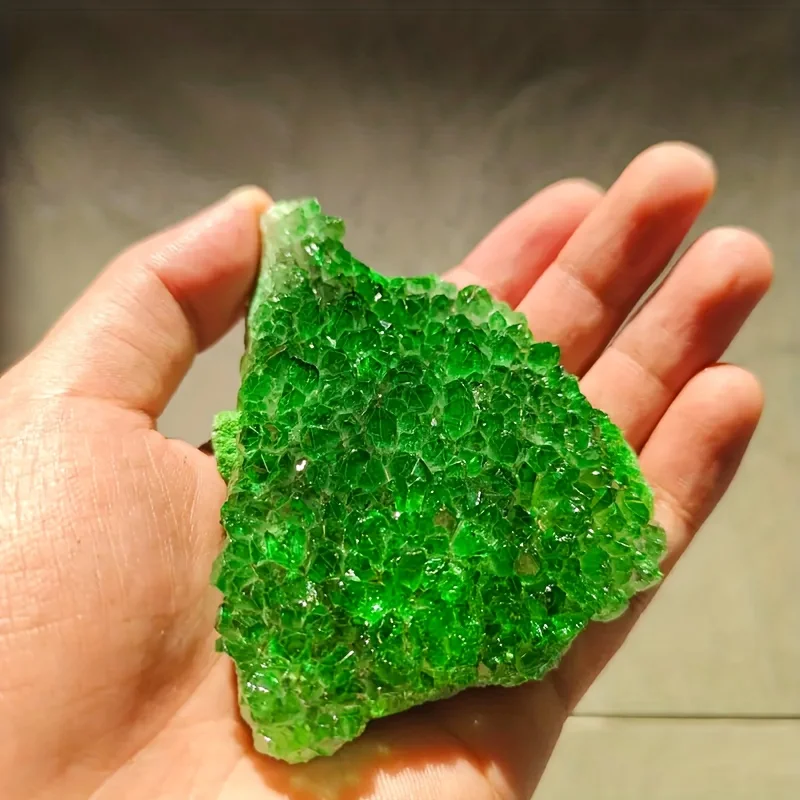 A green crystal cluster, perfect for home and office décor, and a festive gift. A captivating green quartz crystal cluster