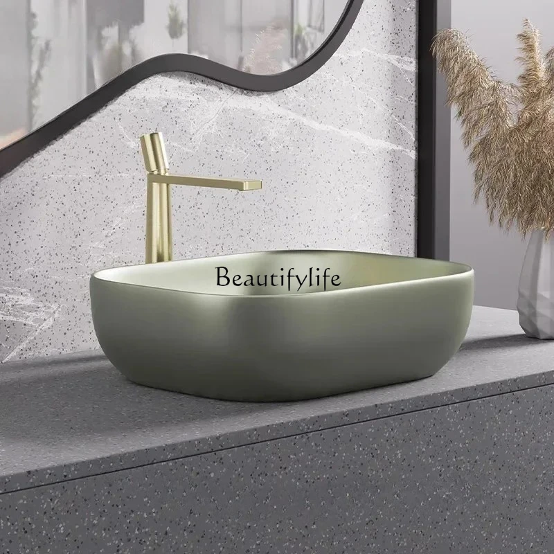 

Ceramic Luxury Sinks for Toilets Nordic High-end Deep Above-the-counter Basin Simple Oval Designer Bathroom Sink for Balcony