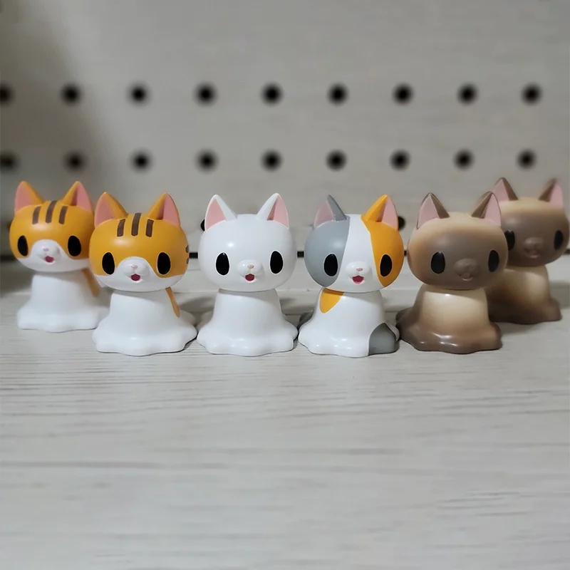 Estatueta de gato líquido Qualia genuína do Japão está transformando em um ornamento de gato tricolor siamês líquido desktop em estoque