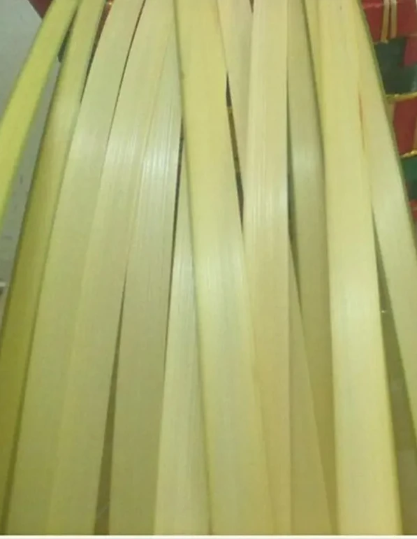 

Efficient and multifunctional bamboo strip layering and slitting machine