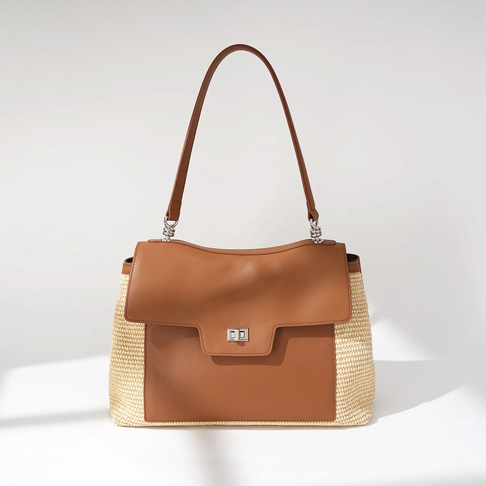 Classic Vintage Inspired Handbag With Solid Color And Textured Finish Designed Also As A Versatile Commuter Diaper Bag