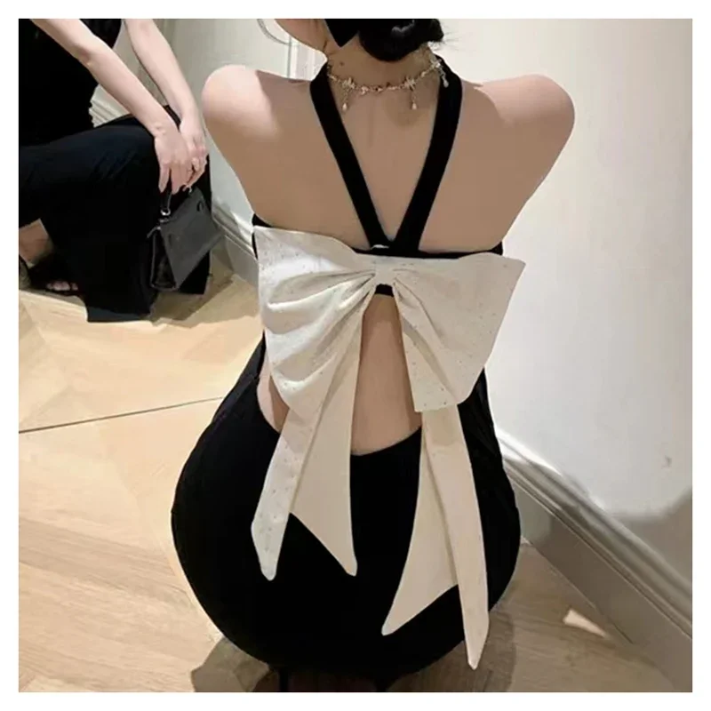 

2024 Black Hanging Neck Dress Summer Pure Desire Spicy Girl Dress Sexy Bow Small Body Slimming Bag Hip Opening