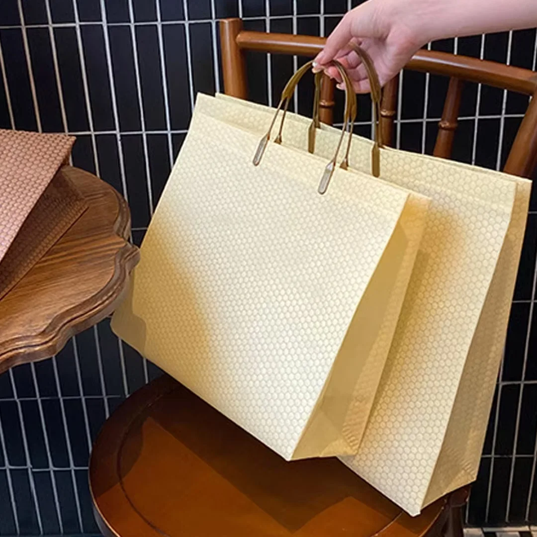 25 قطعة مجوهرات غير منسوجة حمل مقبض حقيبة الزفاف عيد ميلاد التسوق حفلة فستان يومي تي شيرت القماش مستحضرات التجميل تغليف الهدايا