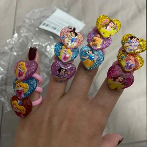 12pcs Disney Frozen Elsa Anna Princess Ring Acrylic Minnie Mouse Unicornio Decoración de la fiesta para niños Regalos Fiesta de cumpleaños Suministros de cumpleaños 12 mejores decoraciones de cumpleaños de princesas de ventas - №12
