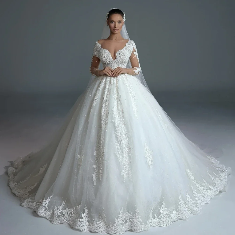 

Flavinke Customized Charming Deep V-neck Long Sleeve Wedding Dresses Luxury Pearls Lace Appliques Bridal Gown Dresses For Bride