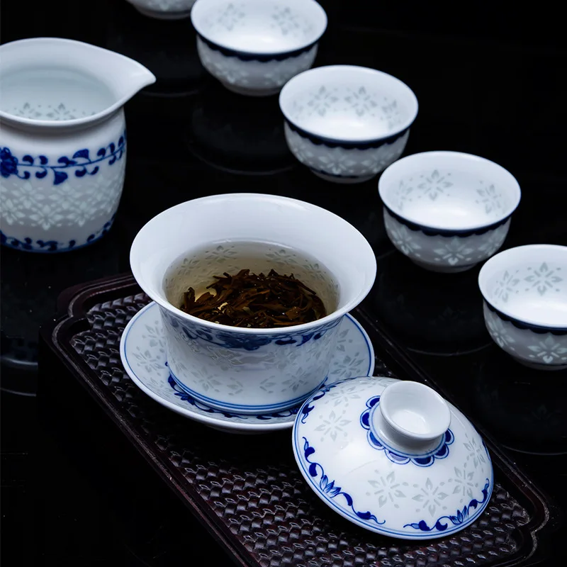 

Jingdezhen High end Hand Painted Blue and White Porcelain Tea Set with Chinese Hollowed and Exquisite High Temperature White Por