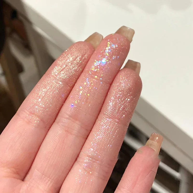 อายแชโดว์ 9 สีแวววาวพาเลทท์แชมเปญสีชมพูมุกอายแชโดว์ชิมเมอร์ไฮไลท์โทนเย็นแต่งหน้าประกายตาที่มีเสน่ห์